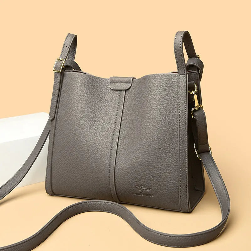 Vertical square ladies shoulder bag in soft PU with internal organisation compartments