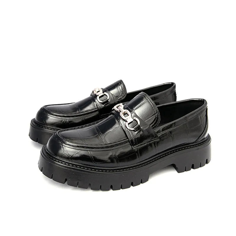 Men's crocodile print platform loafers in black, brown and yellow colours showing textured leather and flat heel design