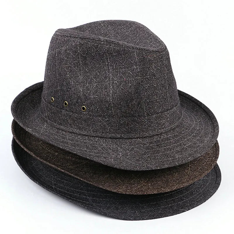 Classic brown fedora hat for men on a wooden stand, showing pinched crown and medium brim.
