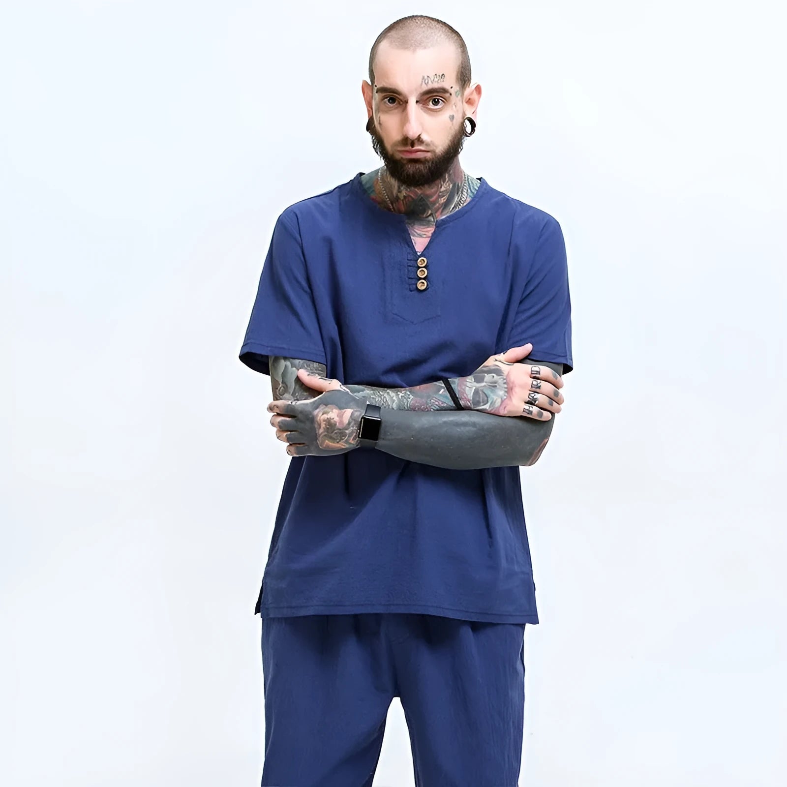 Loose grey cotton T-shirt for men on a hanger, showing short sleeves and pullover style.