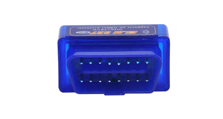Small black OBD2 Bluetooth scanner car diagnostic code reader next to a vehicle's diagnostic port.