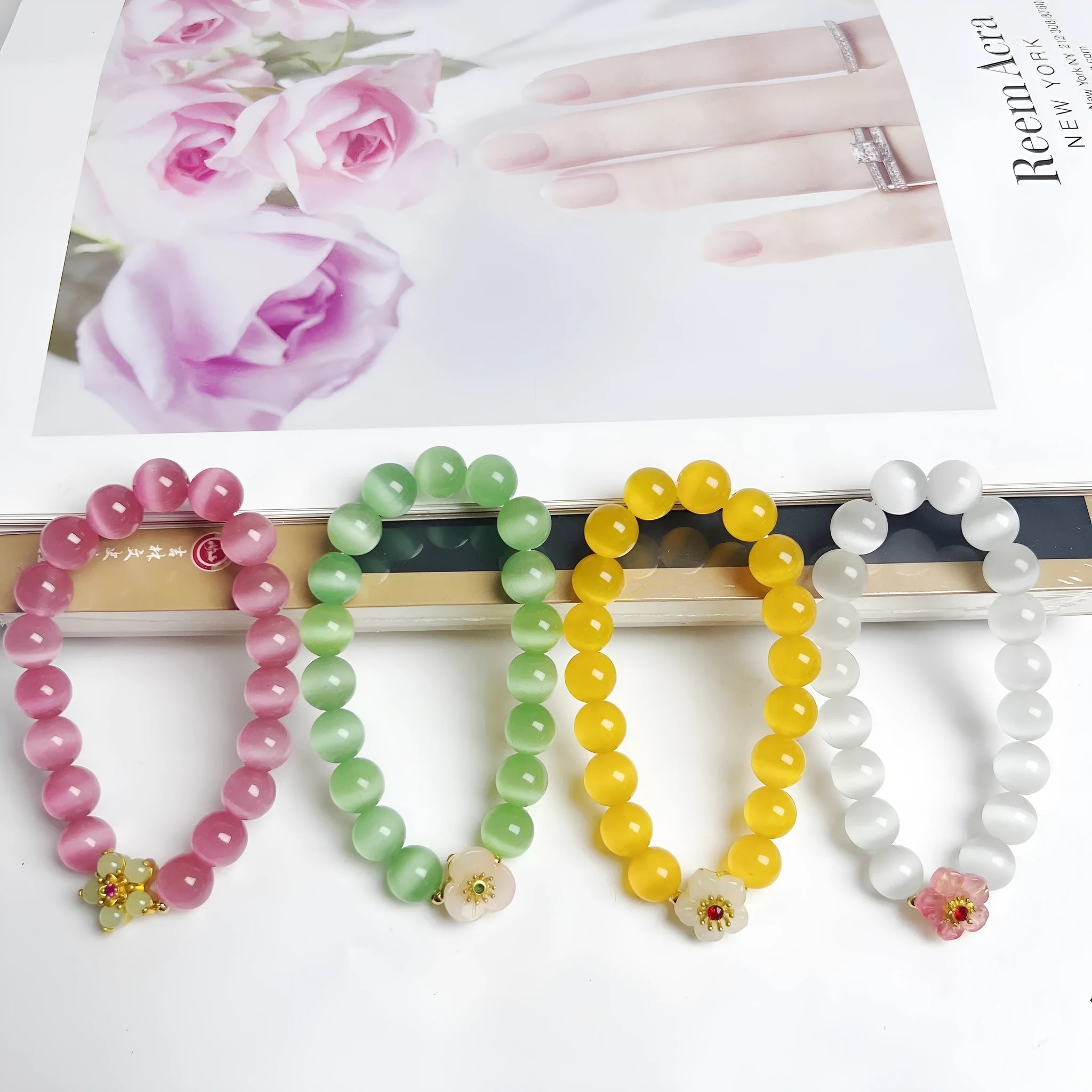 Handmade glass beaded bracelet with floral design in yellow, pink, white or green colour options