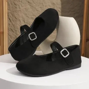 Women's solid black low-top canvas fisherman shoes with a flat rubber sole.