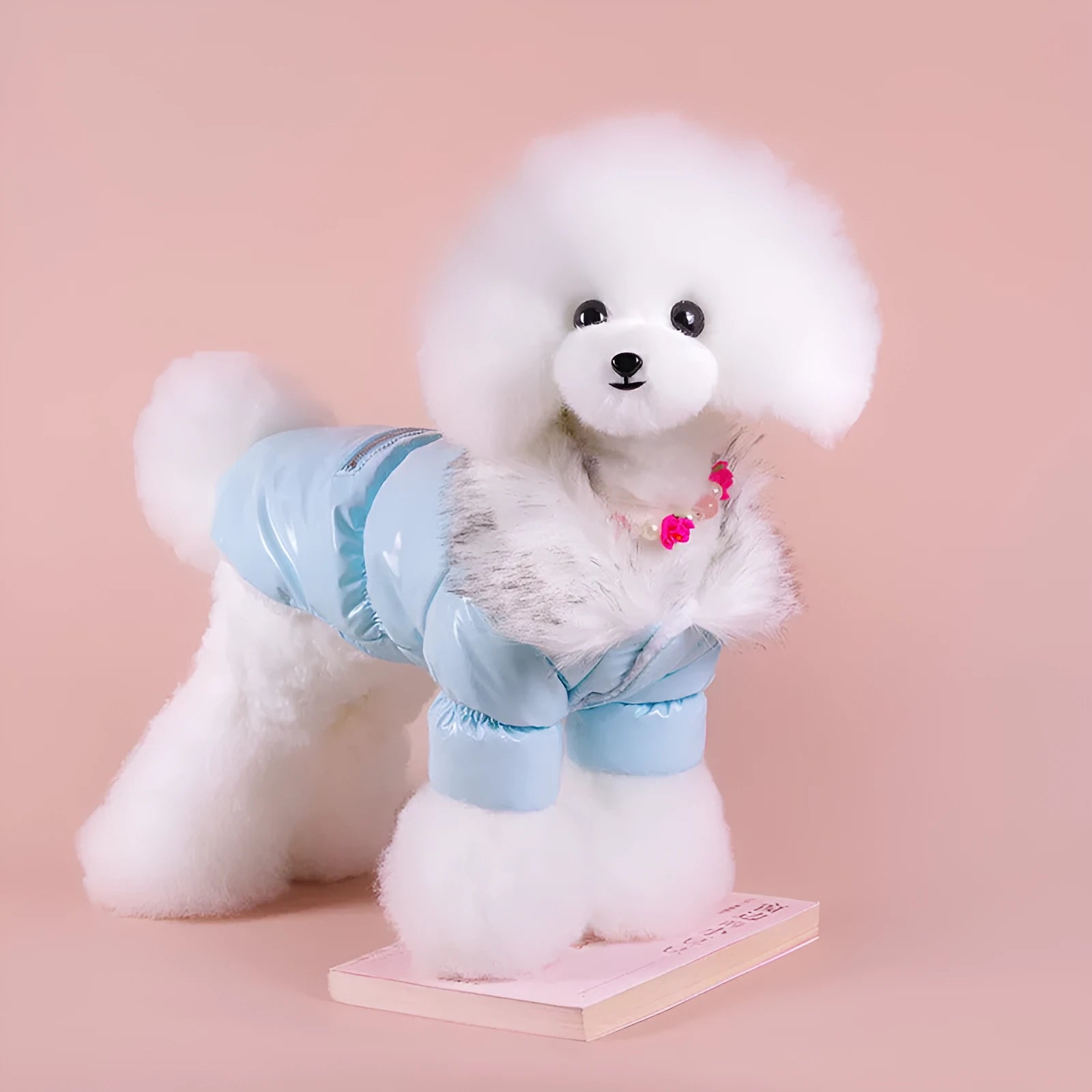 Blue British-style thick cotton winter jacket for a dog on a winter day.