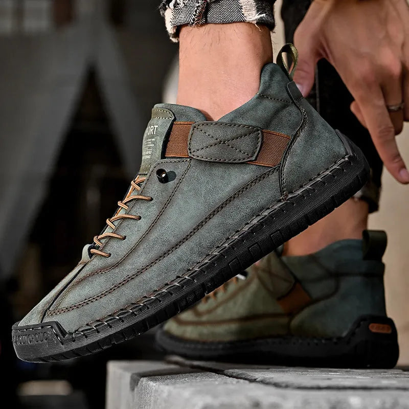 Men's mid-calf Martin boot in khaki with stitching detail on a rubber sole.