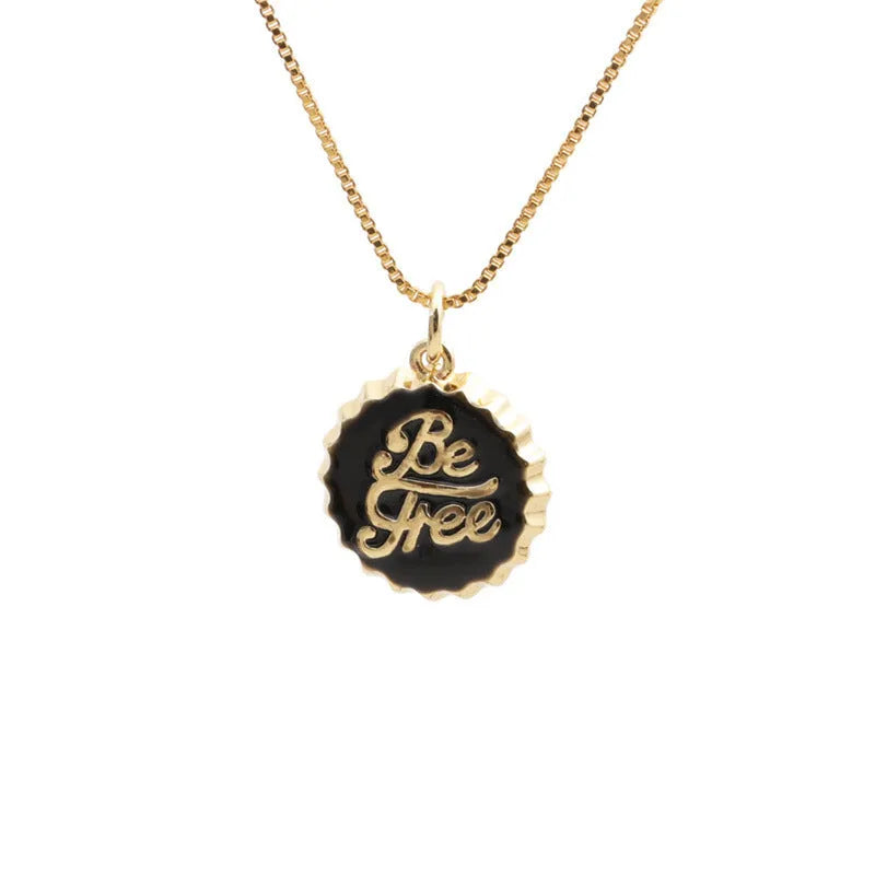 Copper Be Free bottle cap pendant necklace with a gold-plated finish on a 40cm box chain.