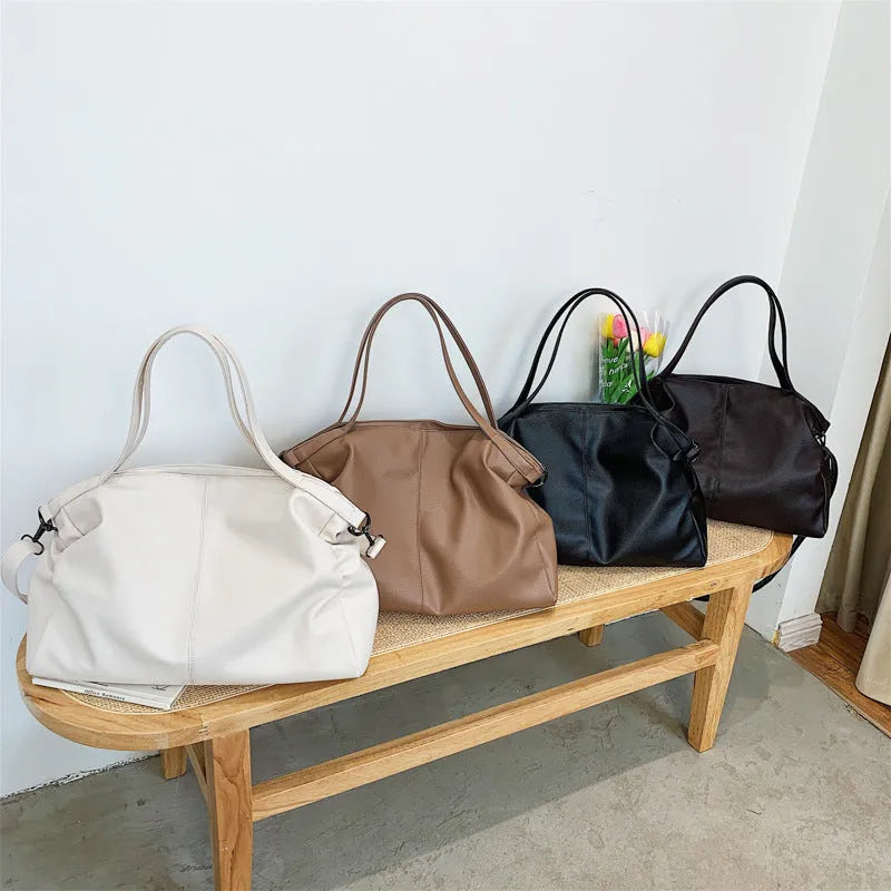 Large soft PU messenger bag in horizontal square shape with adjustable shoulder strap