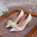 Women's stiletto heel bride wedding dress shoes in milky white with pointed toe and low top