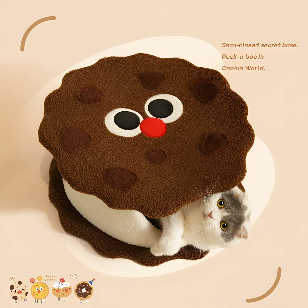 Khaki coloured enclosed cat house shaped like a sandwich cookie nest with a single entry.