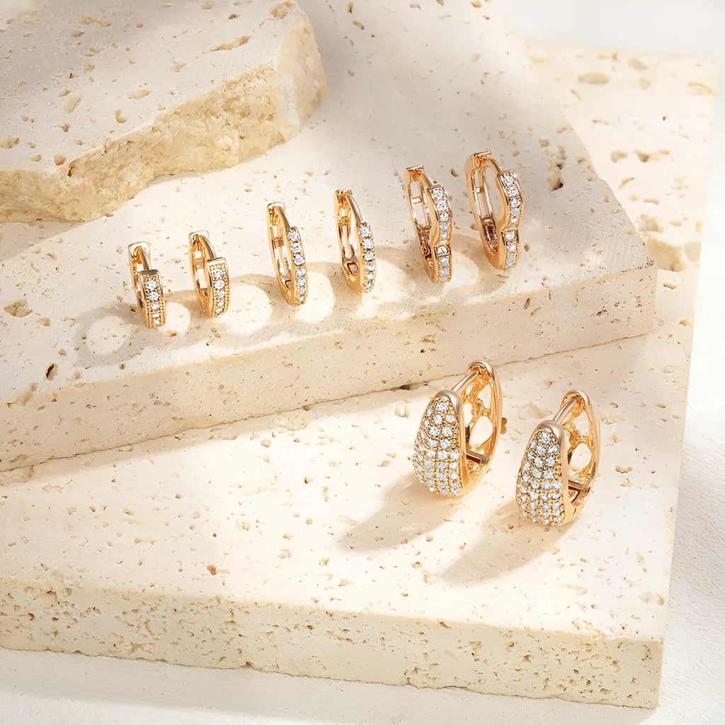Brass gold plated heart-shaped zircon ear clip earrings with gang drill detailing