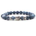 Tigereye Buddha head stretch bracelet with natural stone beads on wrist