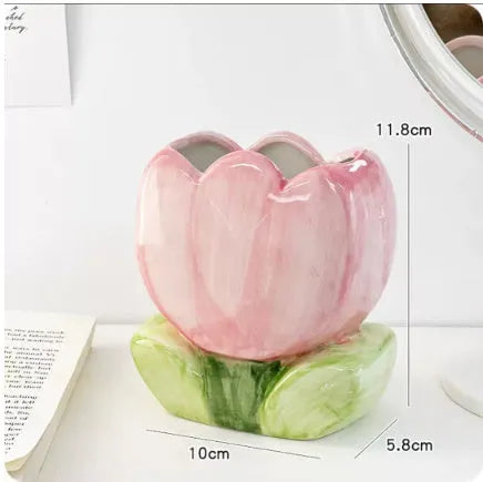 Ceramic flower pen holder storage box in a floral design on a desk