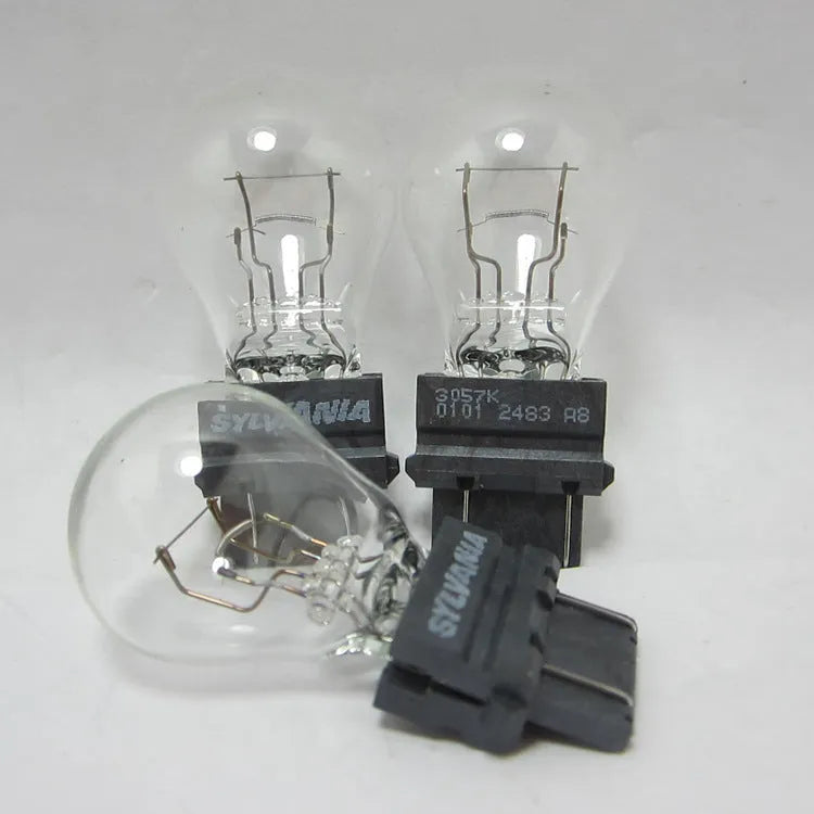 Wagner brake light bulb with dual wire design showing plastic alignment dots and 16mm socket