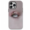 Dark heterochromatic spider design resin case for iPhone 15 Pro Max on a table