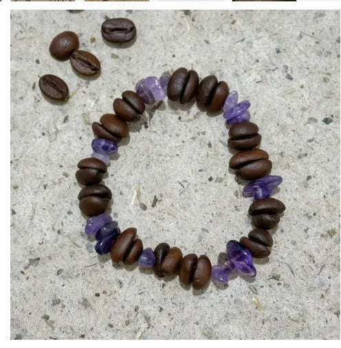 Handmade coffee bean bracelet with 16mm geometric charm showing colour variations