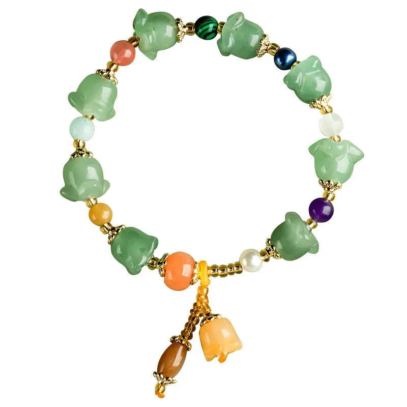 Carved natural Xinjiang Jinsi jade bracelet with aventurine orchid beads and Gobi jade topaz accents.