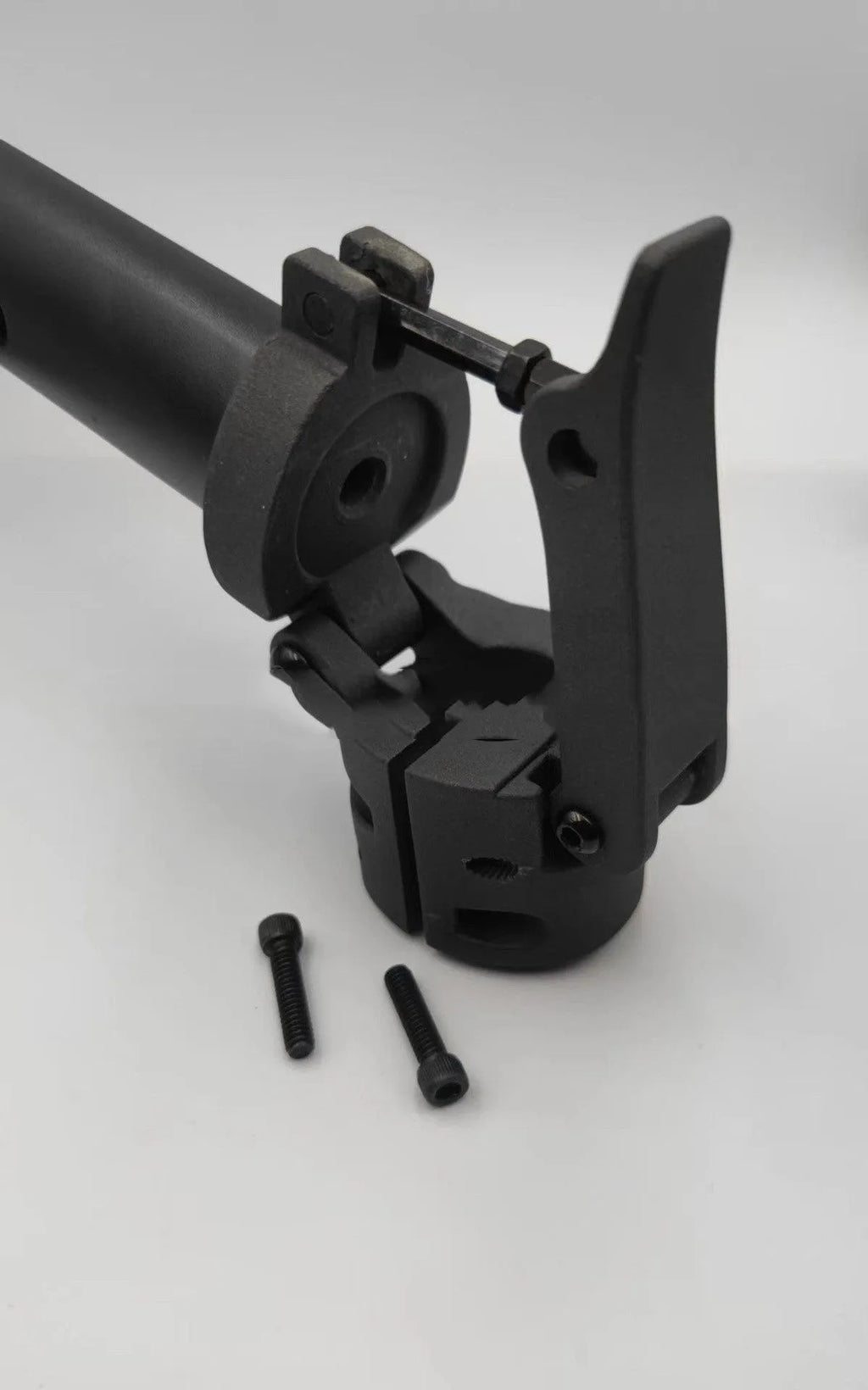 Matte black folding upright bar accessory for No. 9 electric scooter on a white background.