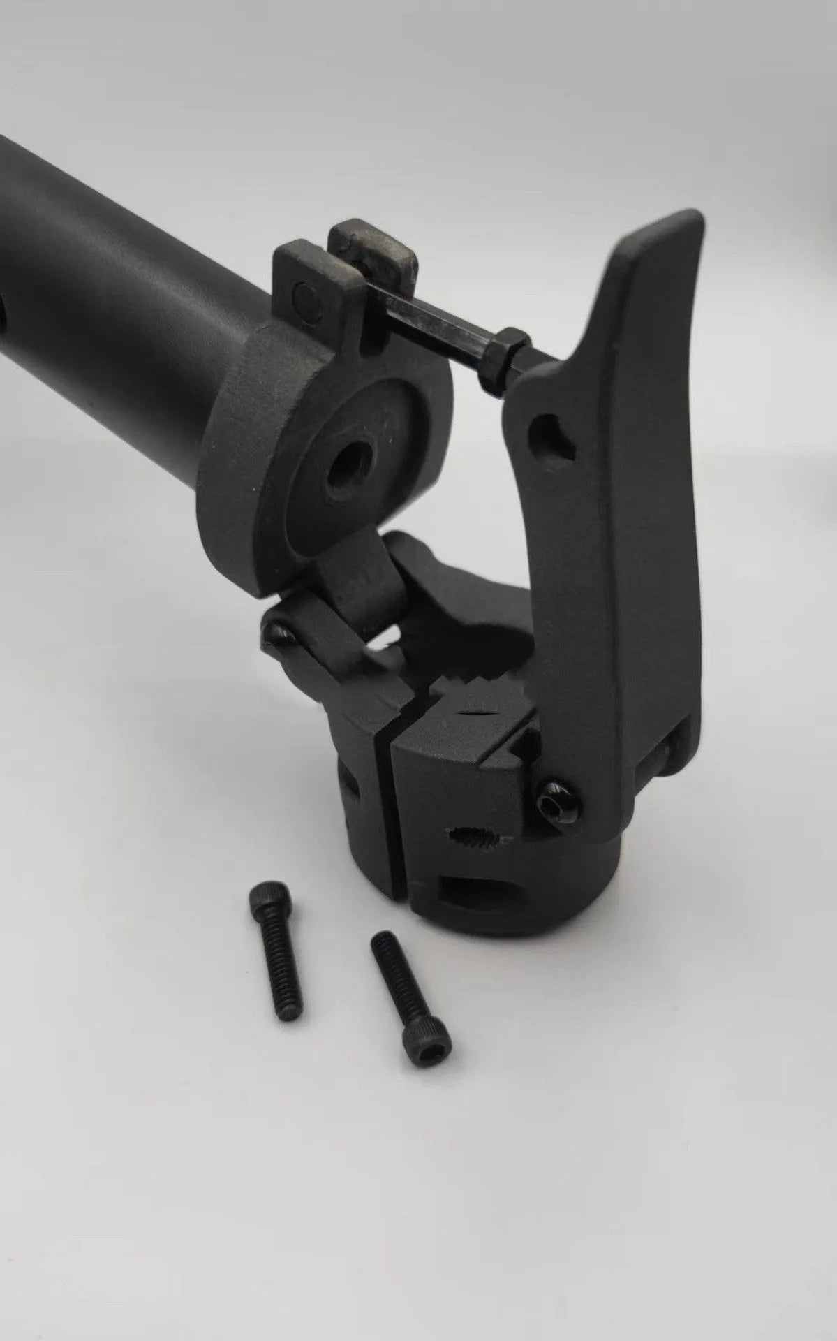 Matte black folding upright bar accessory for No. 9 electric scooter on a white background.