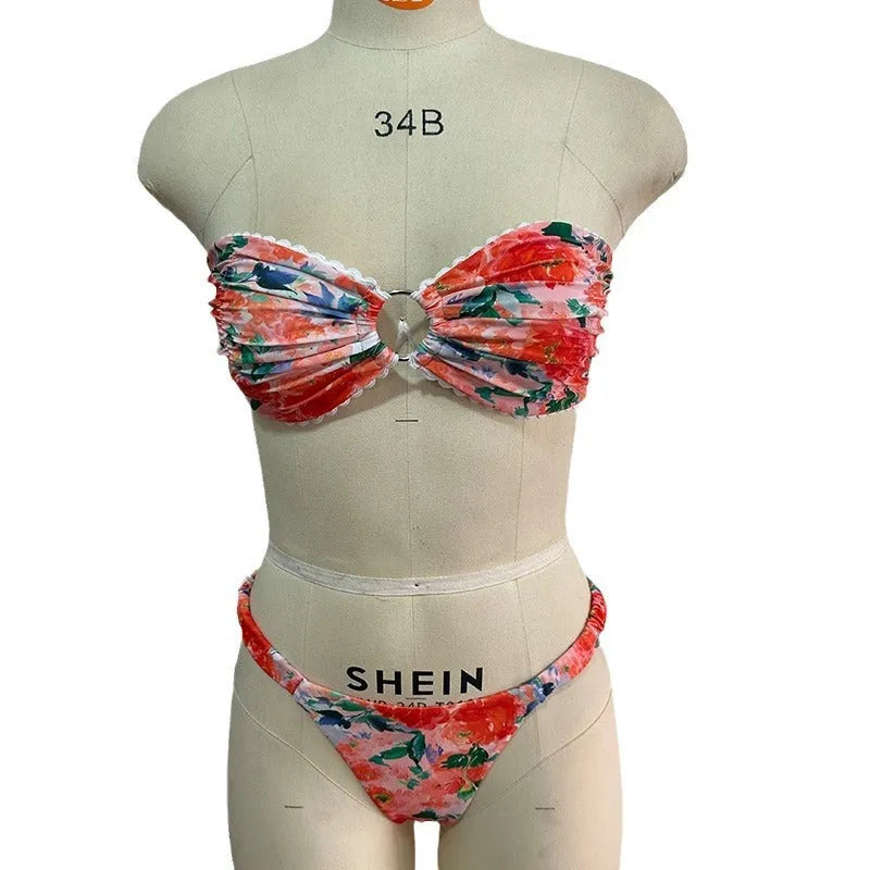 Women's polyester bikini set with floral print tube top and matching briefs for swimming.