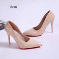 Women's black stiletto heel pump with pointed toe and shallow mouth cut on a white background.